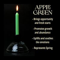 A single apple green chime candle, lit, with a dark background, and a column of text listing its magical properties.