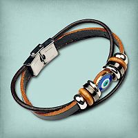 Evil Eye Leather Bracelet, showing the three leather strands, metal clasp, and the evil eye charm flanked by additional beads