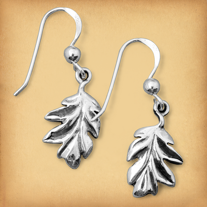 Sterling silver Oak Leaf Earrings, on French hooks for pierced ears. The tiny oak leaves are quite natural looking.