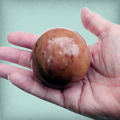 Polished Peachy Pink Mystery Stone Sphere