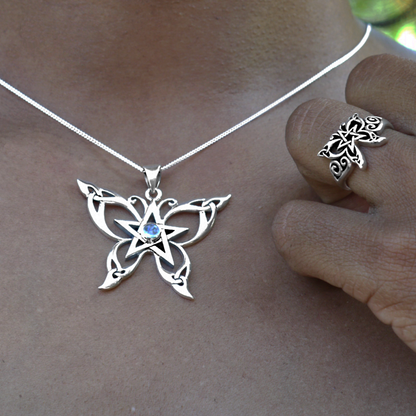 Silver Celtic Butterfly Pendant with moonstone gem, paired with a matching ring, worn together for a coordinated look.