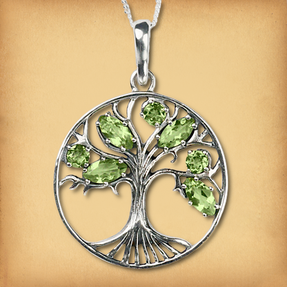 Sterling Silver Peridot Tree Pendant with seven sparkling green gemstones, accenting a tree of life within a circle design.