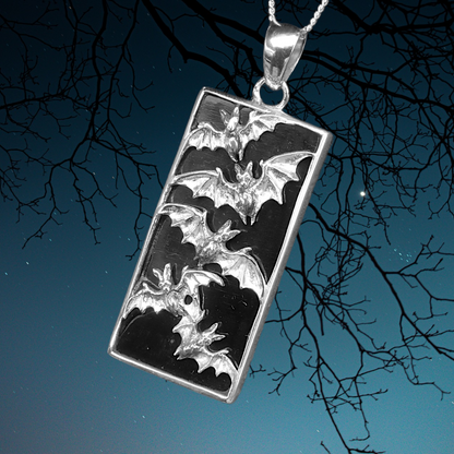 Silver Bat Flight Pendant with Lava Stone