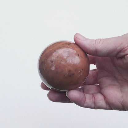 Polished Peachy Pink Mystery Stone Sphere